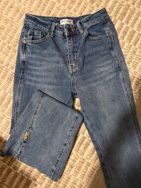 Saint Laurent Medium Blue Denim Jeans with Gold YSL Detail